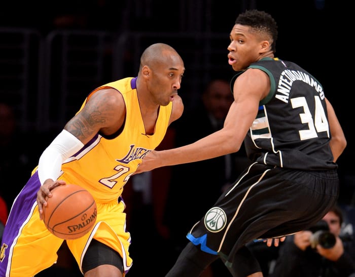 Milwaukee Bucks forward Giannis Antetokounmpo (34) defends Los Angeles Lakers forward Kobe Bryant (24)